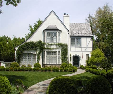 grey and white tudor house|tudor style house history.